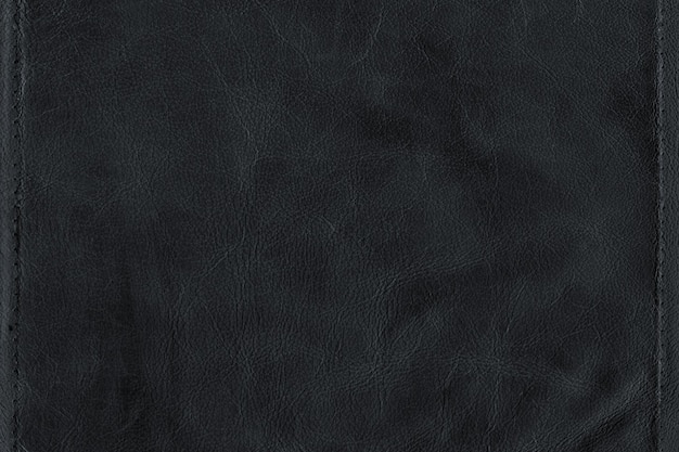 Czarne jasne zdjęcie makro tekstury prawdziwej sztucznej skóry wegańskiej