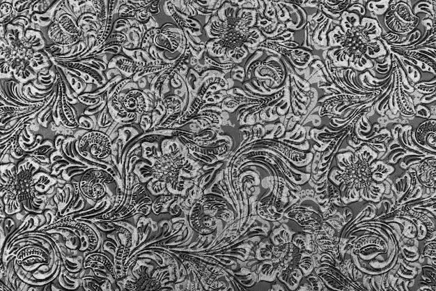 Czarno-szara brokatowa faktura materiału tekstylnego