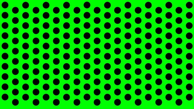 Czarny groszek na zielonym tle bezszwowego druku