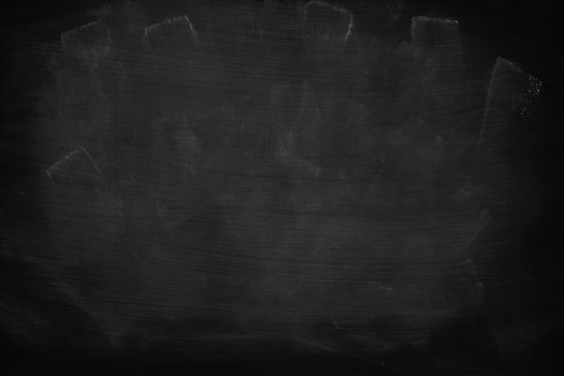 Zdjęcie czarny grunge brudna tekstura abstrakta kreda nacierał na blackboard lub chalkboard tle.