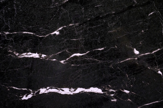 Czarny marmurowy powierzchni tekstury tło