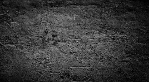 Czarny otynkowany szorstki mur Grunge tła
