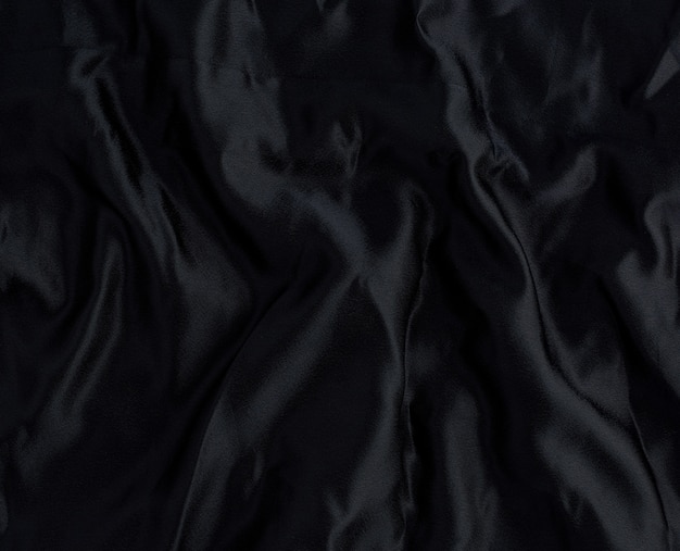 Czarny satynowy materiał tekstylny, materiał do szycia zasłon i innych rzeczy