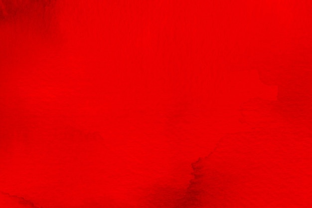 Czerwona akwarela teksturowanej niebieskie tło