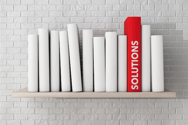 Czerwona książka rozwiązań na półce z kolejnymi czystymi książkami przed ceglanym murem