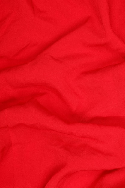 Czerwona lub ciemno zabarwiona tekstura abstrakcyjnej tkaniny do tła