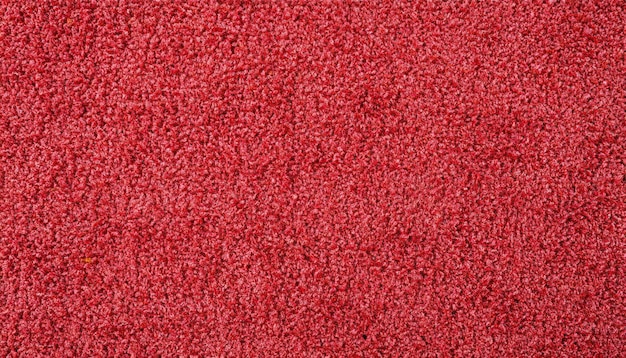 Czerwone tło dywanu widoczne płasko z góry