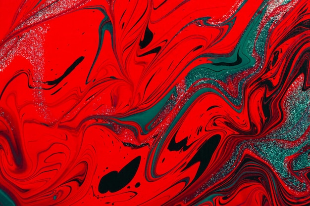 Czerwono-zielony płyn akrylowy, abstrakcyjne kreatywne świąteczne tło