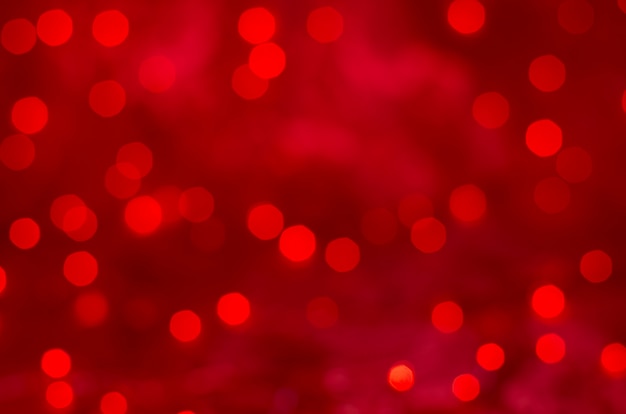Zdjęcie czerwony bokeh tekstury bożych narodzeń tło