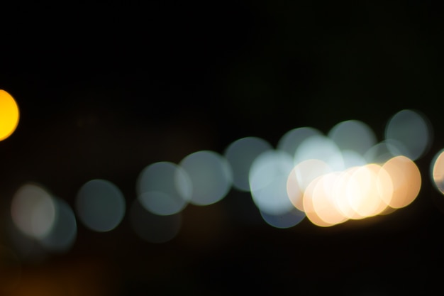 Defocused miasto noc filtrujący bokeh abstrakta tło