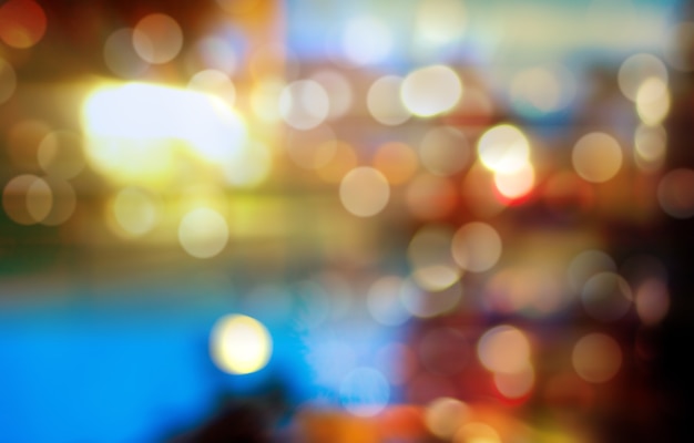 Defocused miasto noc filtrujący bokeh abstrakta tło.