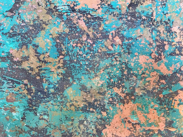 Dekoracyjny niebieski tynk z efektem starzenia Turkusowe tło z beżową pękniętą farbą Tło tekstury