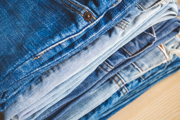 Denim blue jeans stack texture tło zbliżenie
