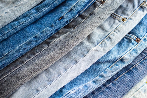 Denim blue jeans stos tekstury tła zbliżenie