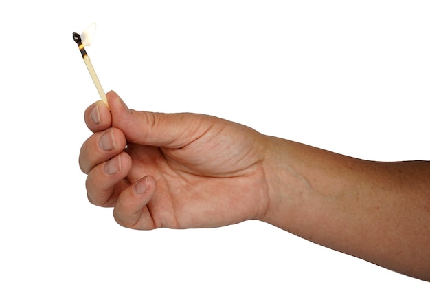 Zdjęcie dłoń trzymająca płonącą zapałkę spalanie zapałek