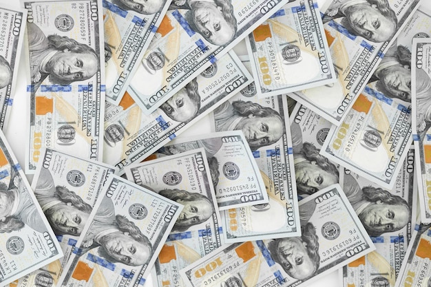 Dollar Bills background stos amerykańskich pieniędzy w gotówce sto dolarów banknotów