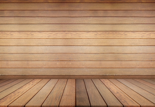 Zdjęcie drewniana podłoga i drewniana ściana, pusty pokój dla tła. duży pusty pokój w stylu folwarcznym z drewnianą podłogą, biała ściana