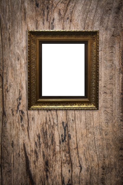 Zdjęcie drewniana ramka na zdjęcia na tle starego drewna