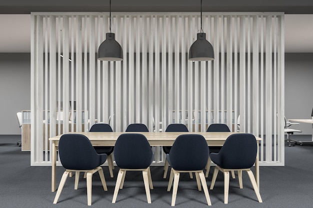 Drewniane wnętrze sali konferencyjnej z betonową podłogą i długim drewnianym stołem z czarnymi krzesłami stojącymi wokół niego. renderowania 3D