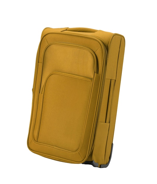 Duża żółta walizka na białym tle