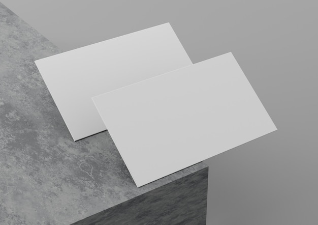 Dwa białe makety wizytówek spoczywają na betonowym podium szablon karty brandingowej ilustracja 3D