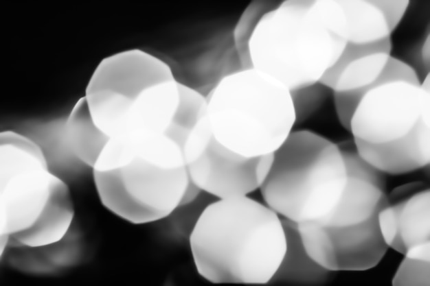 Zdjęcie efektowny biały błyszczący brokat na czarnym tle streszczenie boże narodzenie nowy rok i walentynki tło bokeh nakładki na luksusowe wakacje projekt marki