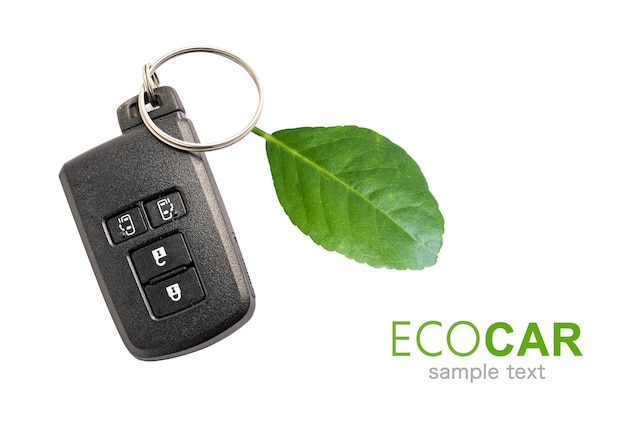 Ekologiczny samochód Klucz samochodowy z zielonym liściem energia elektryczna koncepcja ekologii ekologicznej środowiska