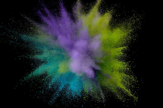 Eksplozja kolorowego proszku. Streszczenie zbliżenie pyłu na tle. Kolorowe eksplodować. Maluj holi