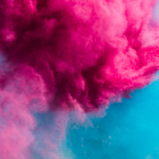 Zdjęcie eksplozja różowego i niebieskiego koloru holi