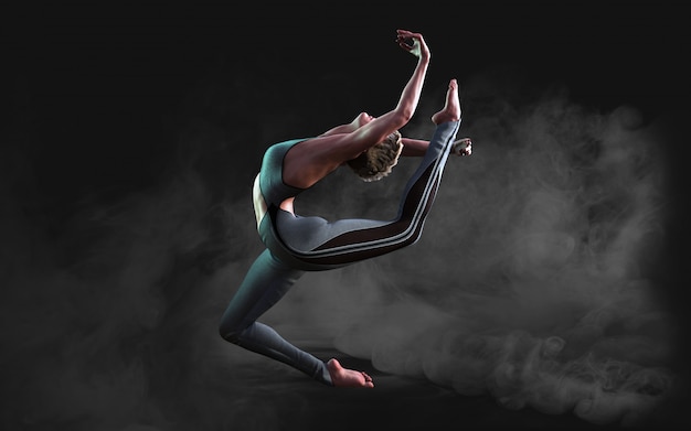 Elastyczna kobieta tańczy i pozuje w ciemności z dymem