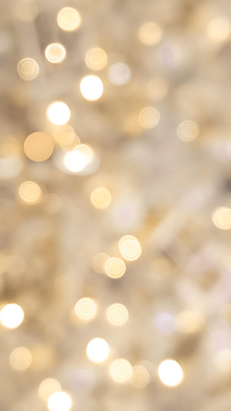 Zdjęcie elegantny złoty i brązowy niewyraźny bokeh z świecącymi świątecznymi światłami