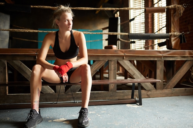 Female Fighter By Boxing Ring