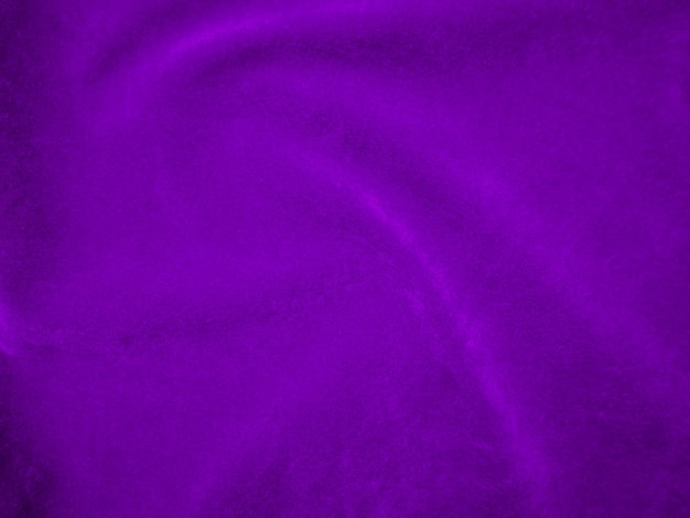 Fioletowa aksamitna tekstura tkaniny używana jako tło Fioletowy kolor tła tkaniny panne z miękkiego i gładkiego materiału tekstylnego zgnieciony aksamitny luksusowy odcień magenty dla jedwabiu