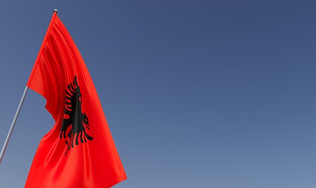 Flaga Albanii na maszcie na niebieskim tle Miejsce na tekst Flaga rozwija się na wietrze Europa Tirana Bałkany Ilustracja 3D