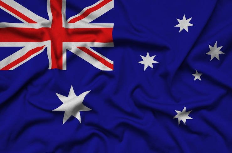 Zdjęcie flaga australii jest przedstawiona na sportowej tkaninie z wieloma zakładkami.