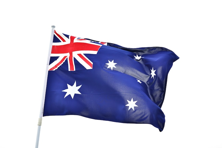 Zdjęcie flaga australii z poruszającą się falą na białym tle