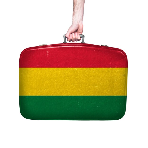 Flaga Boliwii na skórzanej walizce vintage