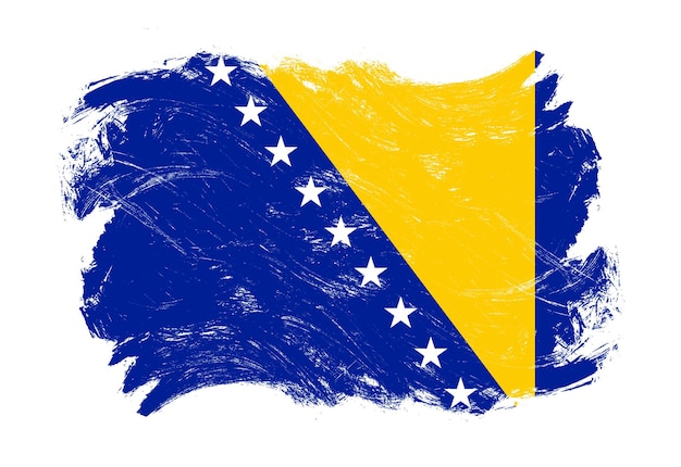 Zdjęcie flaga bośni i hercegowiny na tle pędzla w trudnej sytuacji grunge biały obrys