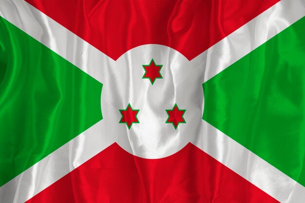 Flaga Burundi na jedwabnym tle jest wspaniałym symbolem narodowym Tekstura tkaniny Oficjalny państwowy symbol kraju