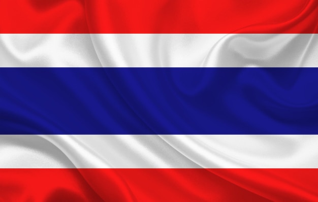 Flaga kraju Tajlandii na panoramie tła falistej tkaniny jedwabnej - ilustracja