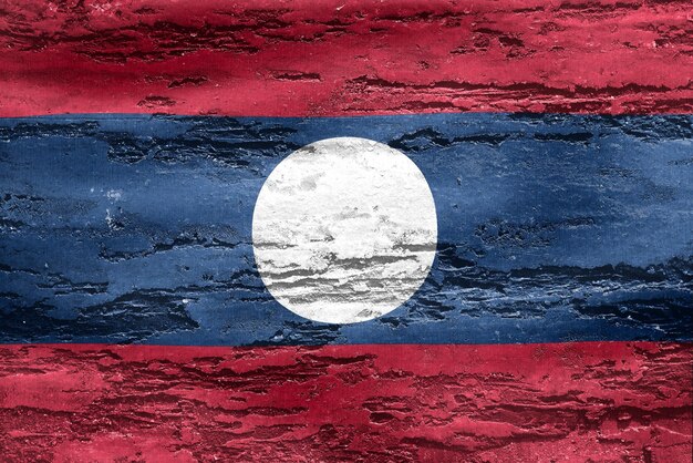 Flaga Laosu realistycznie macha flagą z tkaniny