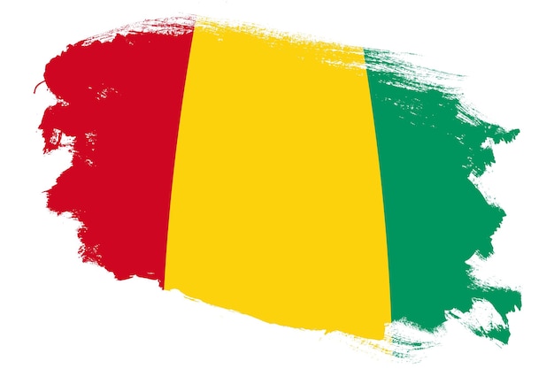 Flaga narodowa Gwinei na grunge obrysu pędzla teksturowanej białym tle