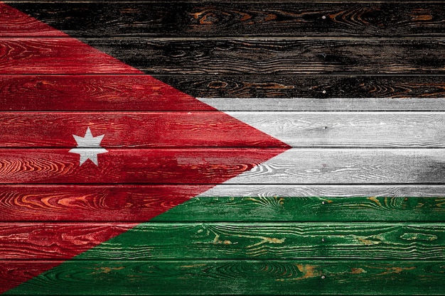 Flaga narodowa Jordanii jest namalowana na obozie z równych desek przybitych gwoździem. Symbol kraju.