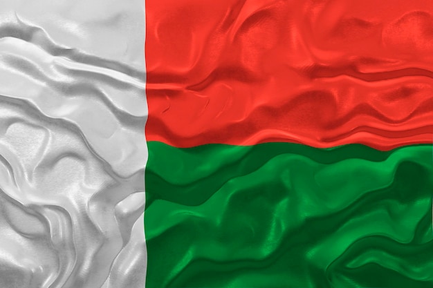 Flaga narodowa Madagaskaru Tło z flagą Madagaskaru