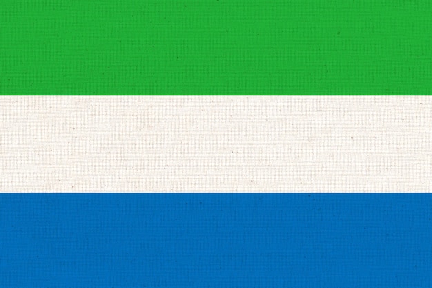 Flaga narodowa Sierra Leone na wzorowanym tle Tekstura tkaniny