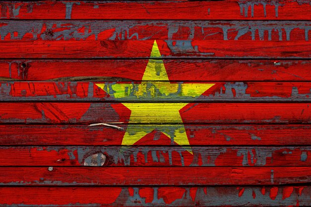 Zdjęcie flaga narodowa vietnamxa jest namalowana na nierównych tablicach symbol państwa