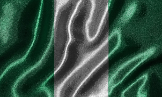 Flaga Nigerii - tkanina flaga kraju Nigerii, tło macha flagą włókienniczych.
