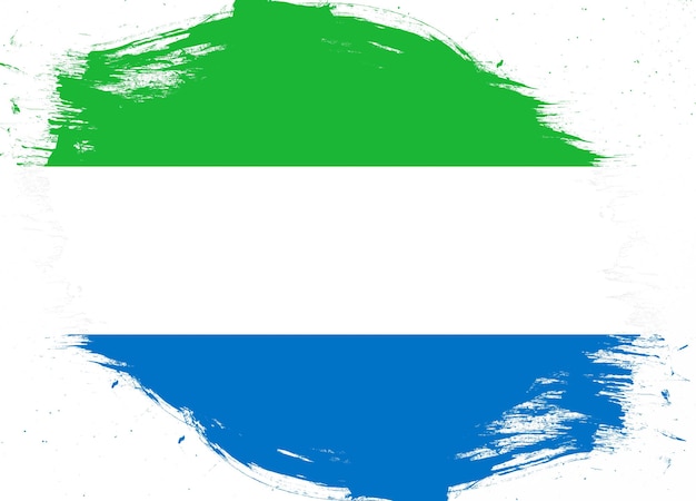 Flaga Sierra Leone na tle pędzla w trudnej sytuacji grunge