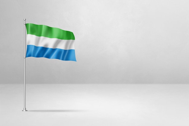 Flaga Sierra Leone odizolowana na tle białej ściany betonowej
