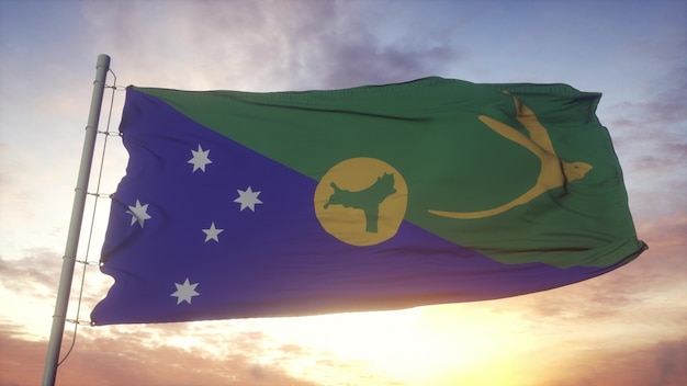Flaga Wyspy Bożego Narodzenia macha na tle wiatru, nieba i słońca. renderowania 3D.